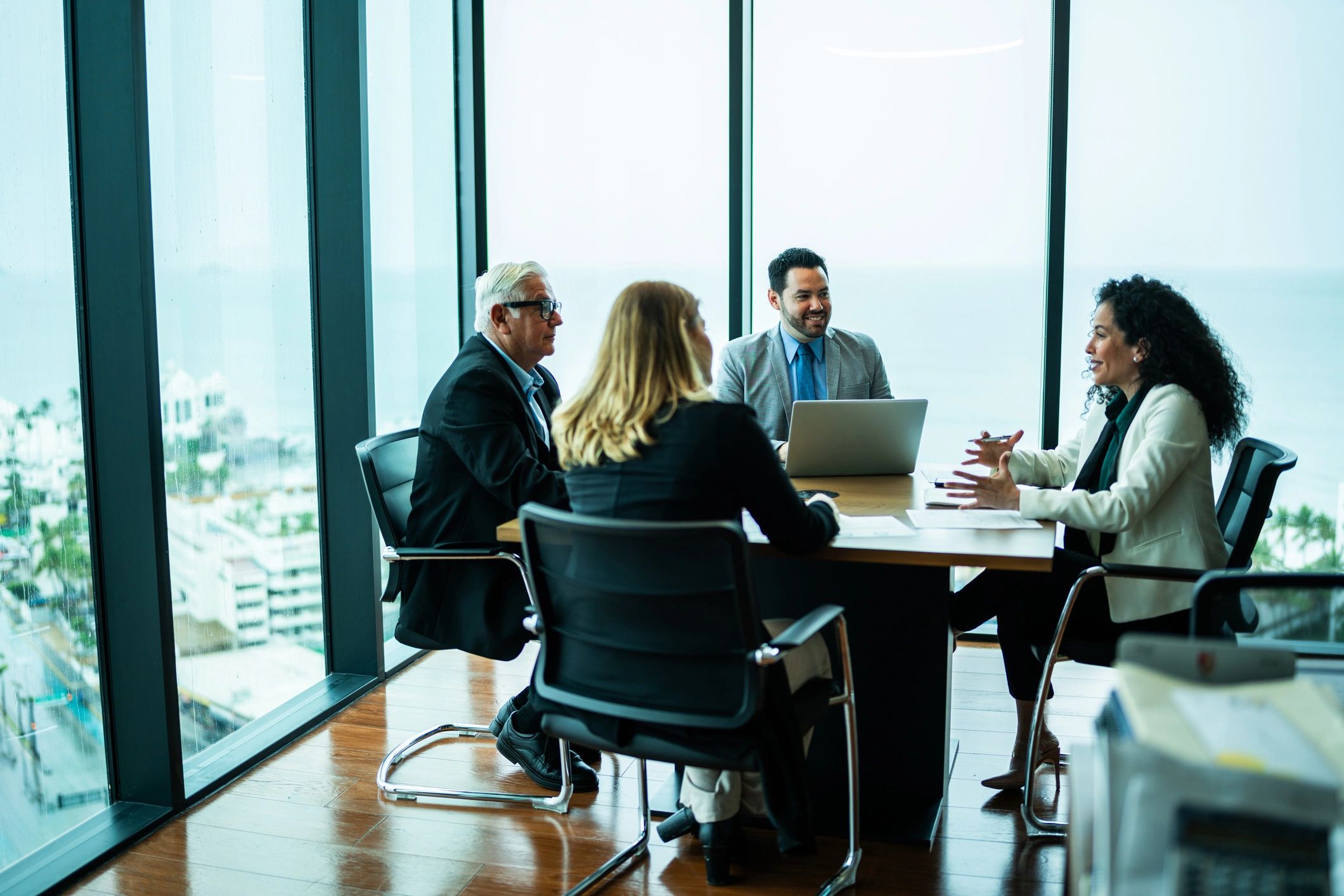 Colleagues in a business meeting discussing next steps